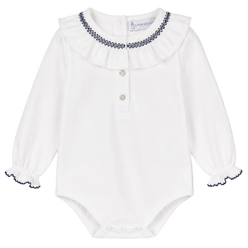 A white long-sleeve baby bodysuit with a ruffled collar, three-button placket, and navy blue embroidered trim details on the collar and cuffs.